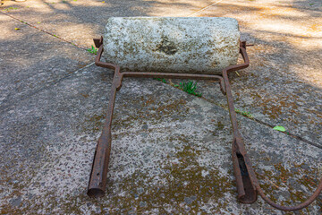 Antique stone roller or garden roller for gardening