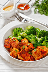 fried salmon bites with steamed broccoli florets