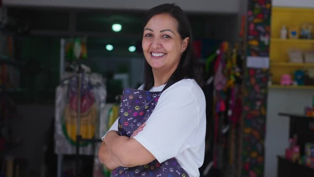 Brazilian Pet Store Proprietor Poses Confidently with Arms Crossed