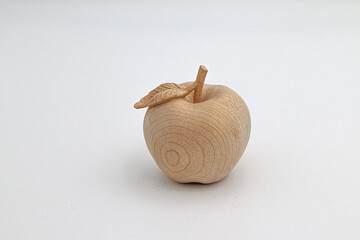 Close up of hand carved wooden apple