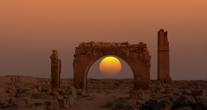 Ruins of the ancient city of Harran - Urfa , Turkey (Mesopotamia) at amazing sunset - Old astronomy tower