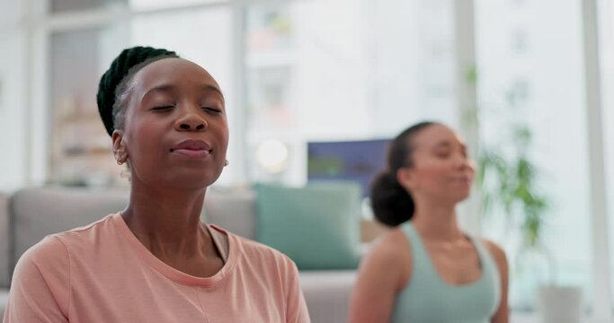 Yoga, meditation and women in living room breathing together, chakra health and mindfulness training in home. Balance, relax and zen, friends in calm holistic exercise for peace and care in apartment