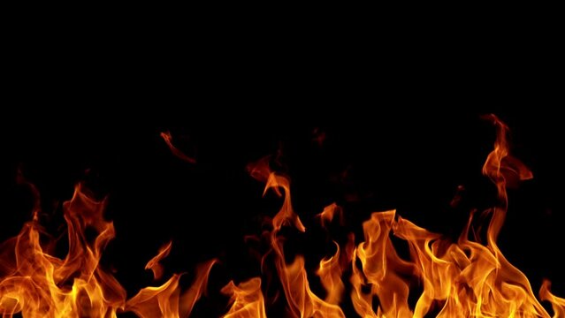 Super Slow Motion of Fire Isolated on Black Background. Abstract Flames Background. Filmed on High Speed Cinema Camera, 1000 fps.