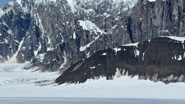 Float plane over Denali mountains aerial landscape