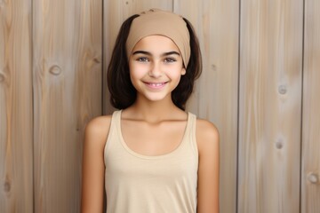 Happiness Arab Girl In A Beige Tank Top On Wooden Plank Background . Happiness In The Arab World, Arabian Fashion For Girls, Women Empowerment, Wooden Backgrounds In Photography