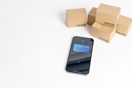 credit card application on cellphone with parcel box on white background