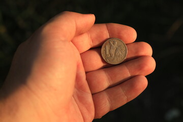 Old Czechoslovakian coin in hand