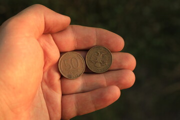 Old coins of Russian Federation in hand