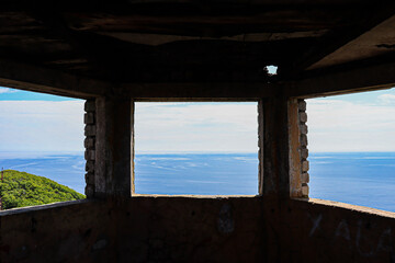 view of the sea from the window. Tourism and travel in autumn. Holidays in the mountains.