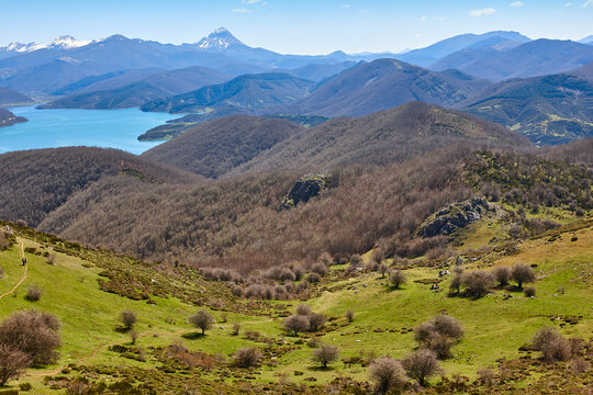 Picturesque reservoir and mountain landscape in Riano. Trekking route. Spain