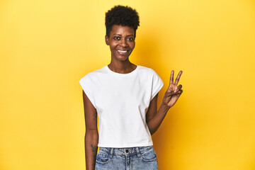 Elegant African woman, short hair, white tank top, Elegant African woman, short hair, white tank...