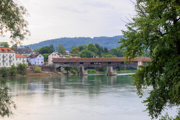 Fototapeta na wymiar The historic old wooden bridge between Germany and Switzerland over the Rhine at Bad Säckingen