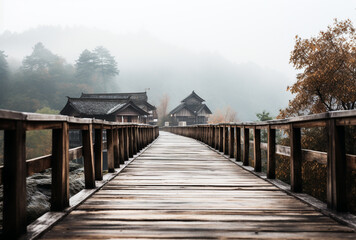 Fototapeta premium Film picture of Decayed old wooden bridge in a rural village humidity of the air there is a white fog in the morning.