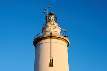 lighthouse on the pier in Malaga Spain