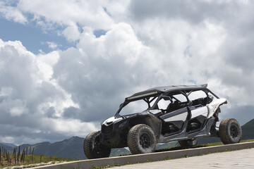 offroad utv side  by side buggy in a mountains - 637350435