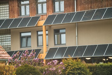 Fototapeta premium Solar panels. Photovoltaic panels PV on the sky background. Solar power plant. Blue solar panels. An alternative source of electricity.