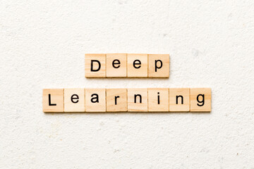 Deep Learning word written on wood block. Deep Learning text on table for your desing, concept