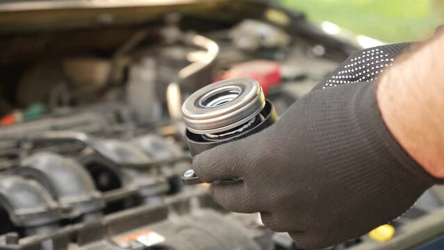 A new spare part with an injection bearing assembly for car repair. Car repair and maintenance.