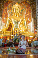 Fototapeta premium Lanna female at the temple in Chiang-Mai, Thailand.
