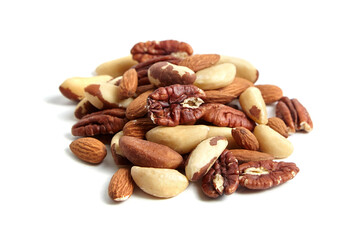Fototapeta premium Mixed nuts isolated on white background. Nut medley of almonds, Brazil nuts, and pecans