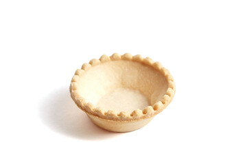 Unfilled tartlet shell isolated on white background. Empty tartlet cup. Isolated tartlet shell ready for filling
