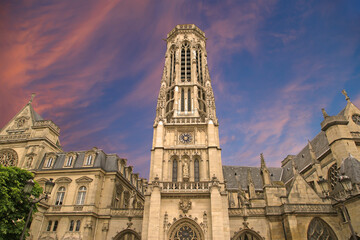 Fototapeta na wymiar Great gothic church of Saint Germain l Auxerrois (against the background of a sky at sunset), Paris, France