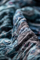 Wrinkled blue textured cloth, fashion industry - 637363662