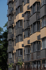 Fototapeta na wymiar Facade of a modern residential building, building texture