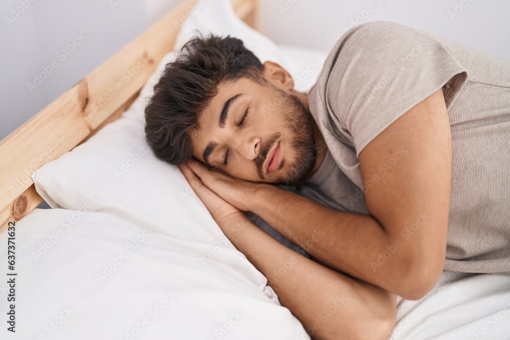 Sticker young arab man lying on bed sleeping at bedroom