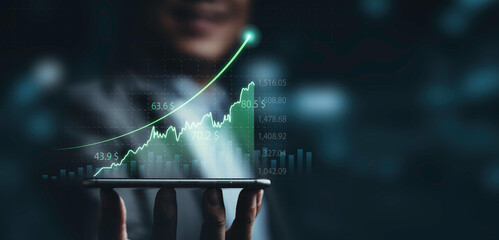 Businessman holding smartphone with technical stock market graph chart and increasing arrow for trader and investor analysis investment to get high profit and dividend ,Financial concept.