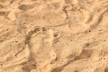 Human footprint in the sand. Footprint on the beach