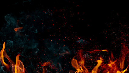 Fototapeta na wymiar Fire blasts on black background, close-up