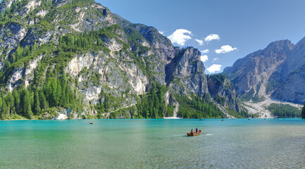 Lake Braies (or Lago di Braies) ship on the lake famous lake in Dolomites Alps Italy Europe extra wide panorama