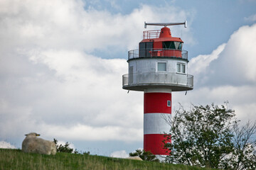Fototapeta na wymiar Lighthouse near Hamburg at the River Elbe