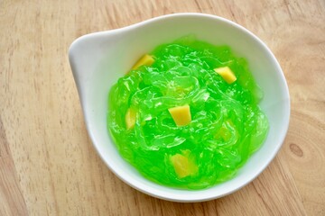 candied topping on dessert in little bow