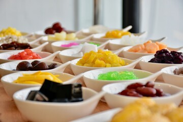 candied topping on dessert in little bow