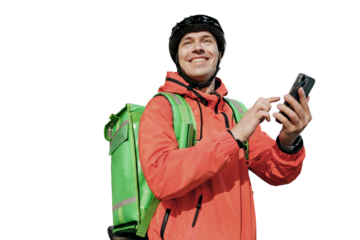 A male courier in uniform uses an application in his phone, an employee of the courier service, fast delivery. Transparent background, png.