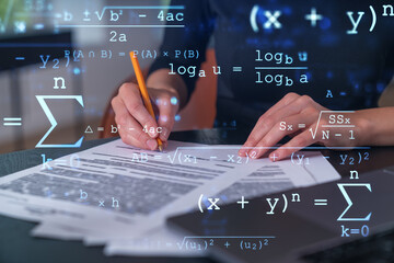 Businesswoman in formal wear taking notes signing contract at office workplace. Concept of...