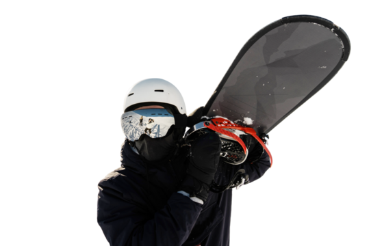 A male snowboarder in equipment and helmet, warm winter sports clothes, holds a snowboard in his hands. Front view. Athlete winter sports. Transparent background, png.