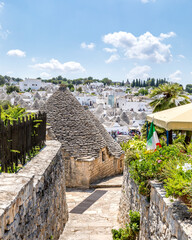 Alberobello, Italy - July 21, 2021: The Trulli of Alberobello in Apulia in Italy. 
