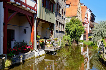 Naklejka premium Beautiful traditional German historic half-timbered houses (also timber-framed houses) in Ulm City, Germany 