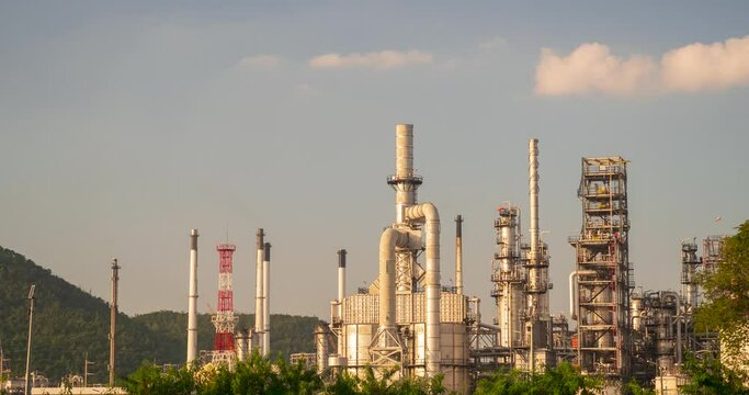 Oil refinery gas petrol plant industry with crude tank, gasoline supply and chemical factory. Petroleum barrel fuel heavy industry oil refinery manufacturing factory plant. Refinery industry blue sky
