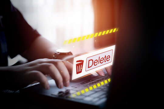 Deleting files from the system. Spam mail, electronic messages or personal data in computer systems. concept of technology and document management from laptop