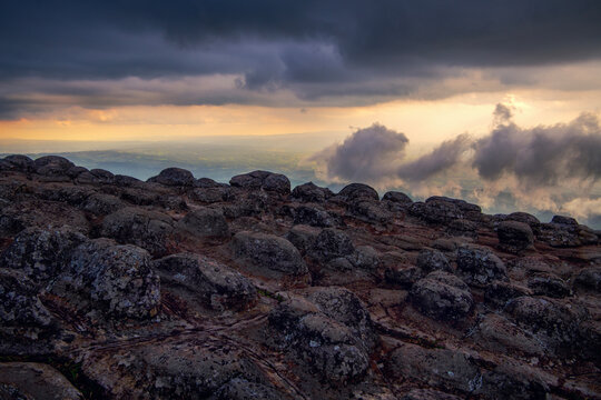 Beautiful sunset before the rain  at  Lan Hin Pum, tourist attration in Phu Hin Rong Kla National Park in Phitsanulok, Thailand