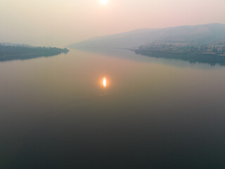 The Columbia River Gorge is a federally protected scenic area forming the boundary between Washington and Oregon. The scenic area is a popular area for hiking, biking, fishing, and water sports.
