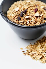 Close-up of muesli prepared without shadow is shown on a white background 