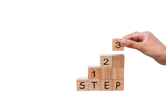Placing a wooden cube block with the text "STEP" as a step towards the goal. on a white background. Business concept for a successful growth process.PNG