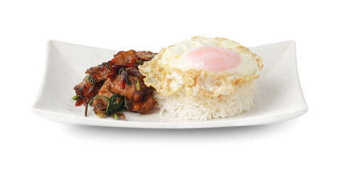 Crispy pork basil rice with fried egg, spicy food, in a round plate isolated on white background with clipping path.