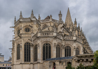 Fototapeta premium Caen, France - 07 27 2023: Castle of Caen. View of the back of St. Peter's Church from the street.