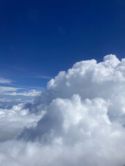 white cloud mass stratified full of bright blue sky bright sunlight visible as a beautiful white line.